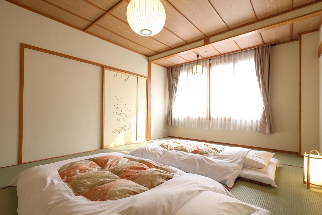 Tsukasaya Ryokan Цуруока Экстерьер фото