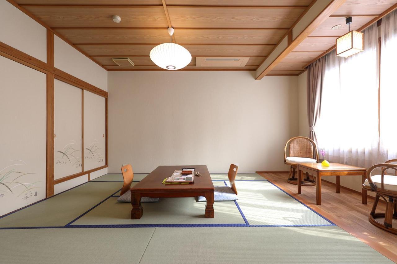 Tsukasaya Ryokan Цуруока Экстерьер фото